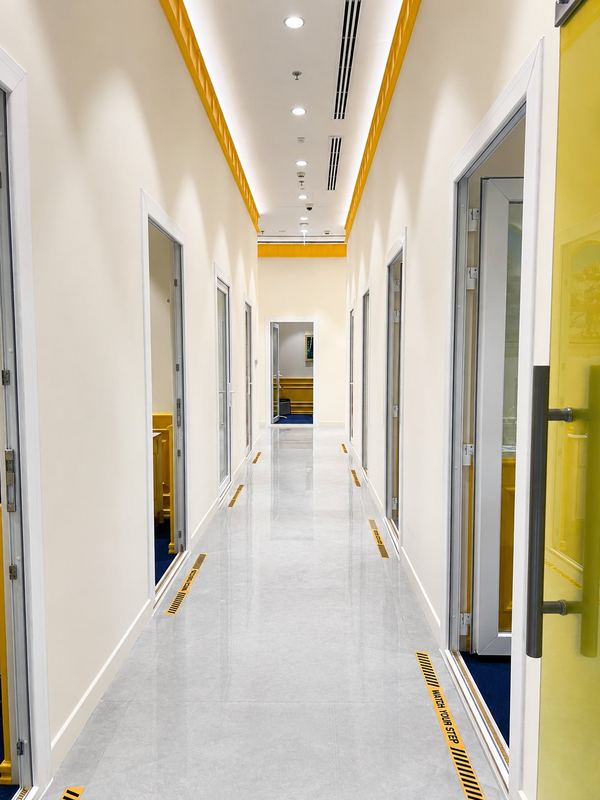 Aureus Music Academy practice room corridor, by Davies Group UAE