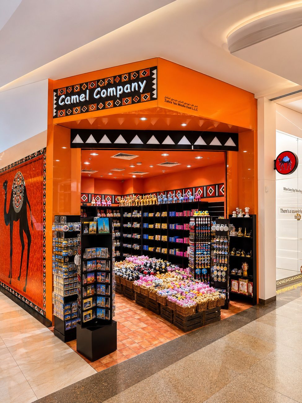 Camel Company storefront facade with camel mural signage, The Dubai Mall