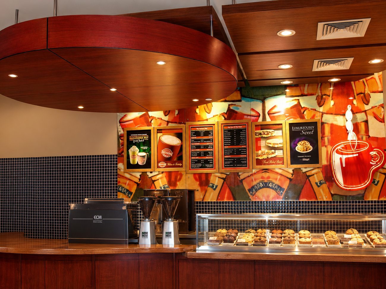 Cinnabon illuminated coffee wall and servery counter by Davies Group UAE