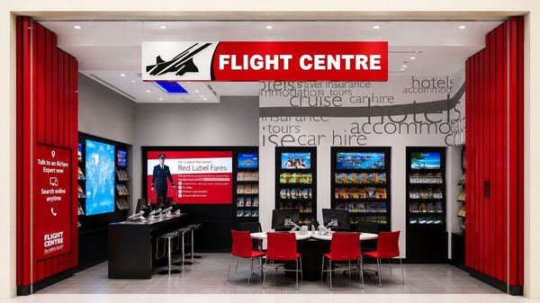 Flight Centre storefront evening view, Arabian Ranches, by Davies Group UAE
