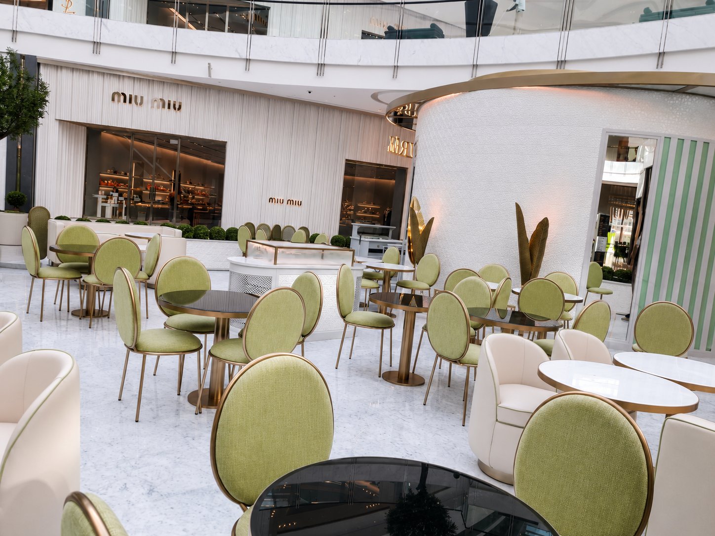 Ladurée café seating with green velvet chairs, Fashion Avenue by Davies Group UAE