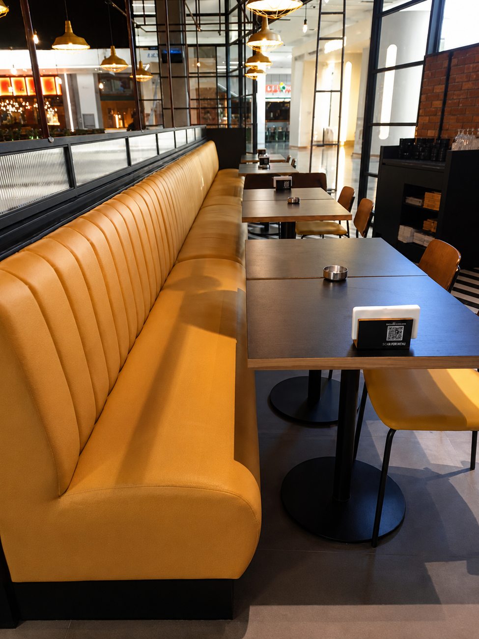 Roadster Diner booth seating along the window row, Mirdiff City Centre